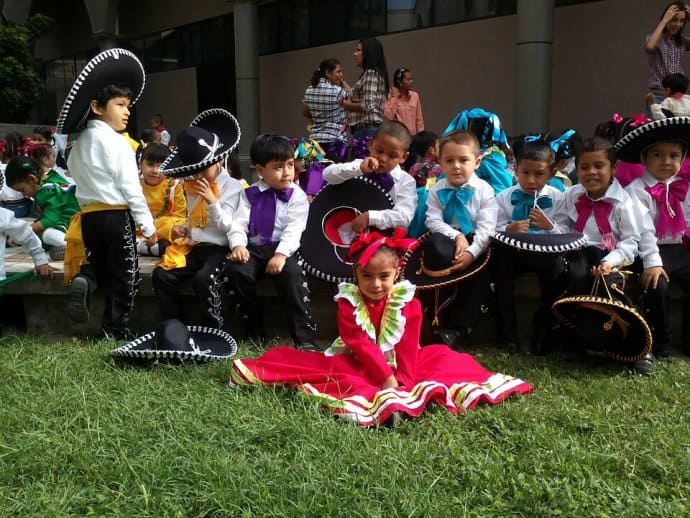 Mexican children performing Mariachi music on Cinco de Mayo