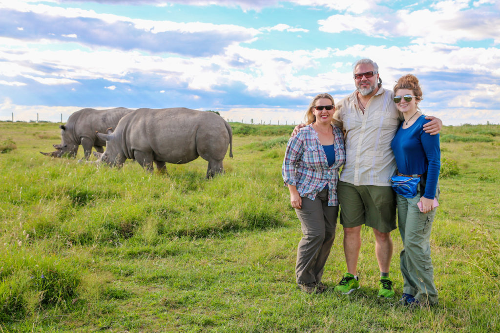 Us With Rhinos at Ol Pejeta Conservancy in Kenya - what would you say to your younger self