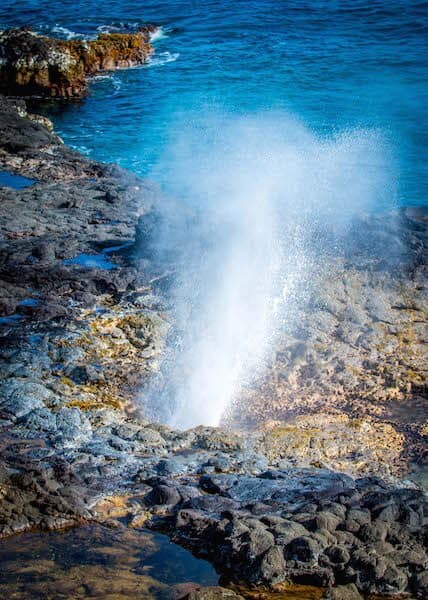 Ocean spray from Spouting Horn on South Shore Kauai