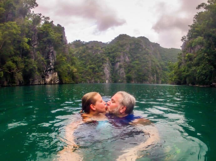 Kissing in Kayangan Lake in Coron, Palawan