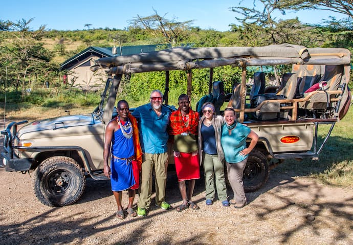 Green Global Travel with Wilson Saningo (center) at Porini Mara Camp