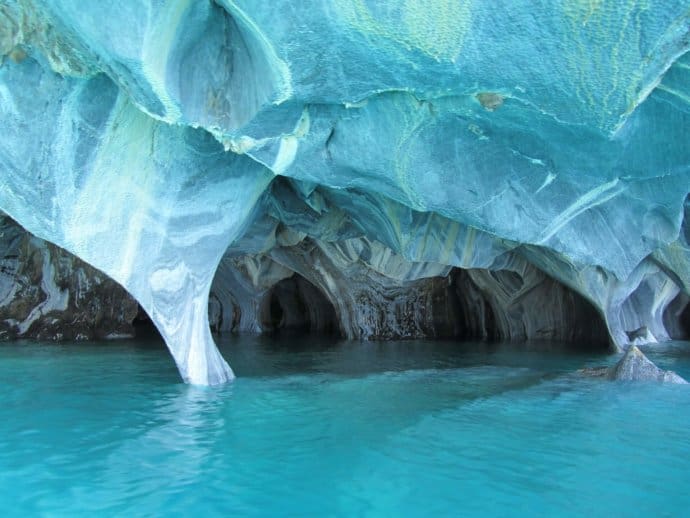 10 Famous Underground Caves for Your World Travel Bucket List, including Chauvet Cave (France), ATM Cave (Belize), Waitomo Glowworm Caves (New Zealand) & more! via @ greenglobaltrvl #WorldTravelBucketList #Caves #CavesandCaverns