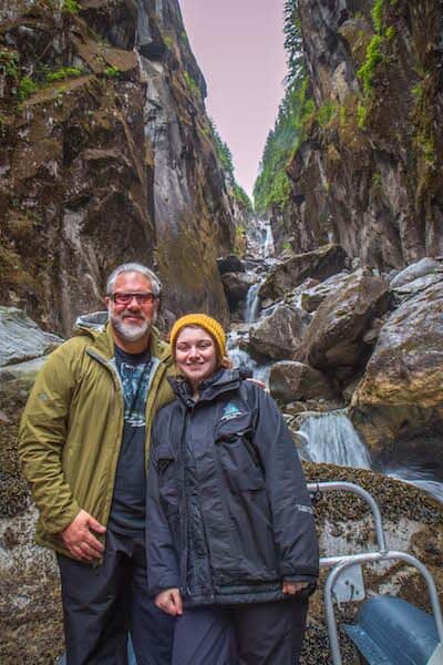 Bret Love & Allie Love at waterfall in Ford's Terror of Alaska's Inside Passage
