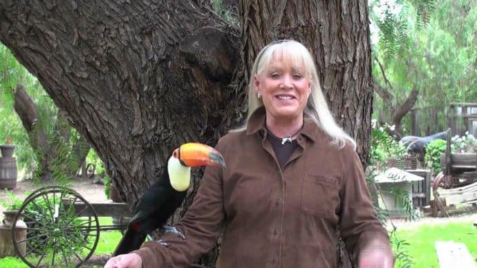 Joan Embrey with Carmen the Toco T0ucan on the Ranch