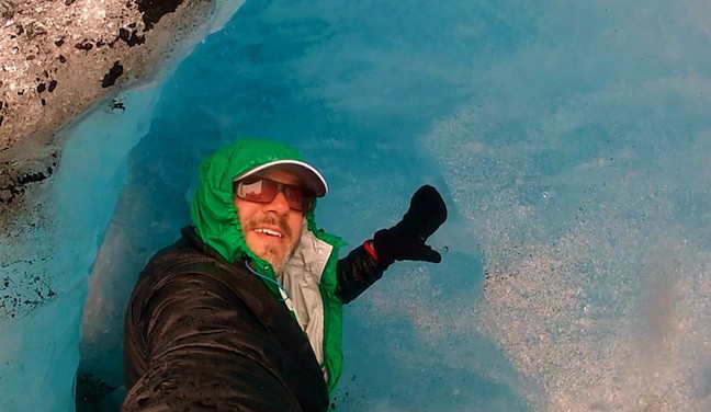 Bret Love inside a glacier in Norway