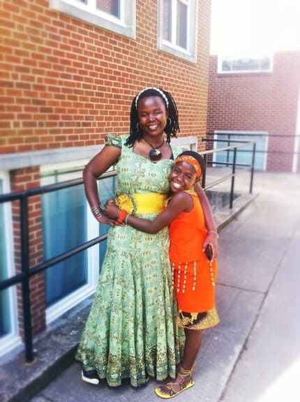 Dorothy Nabwami with an African Children's Choir member