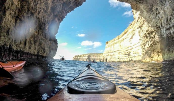Kayaking out of a sea cave on Gozo Island